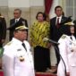 Gubernur Lampung, Arinal Djunaidi bersama Wagub Chusnunia saat dilantik Presiden RI, Joko Widodo di Istana Negara Jakarta Pusat, Rabu (12/06/2019) lalu. (foto: ist)
